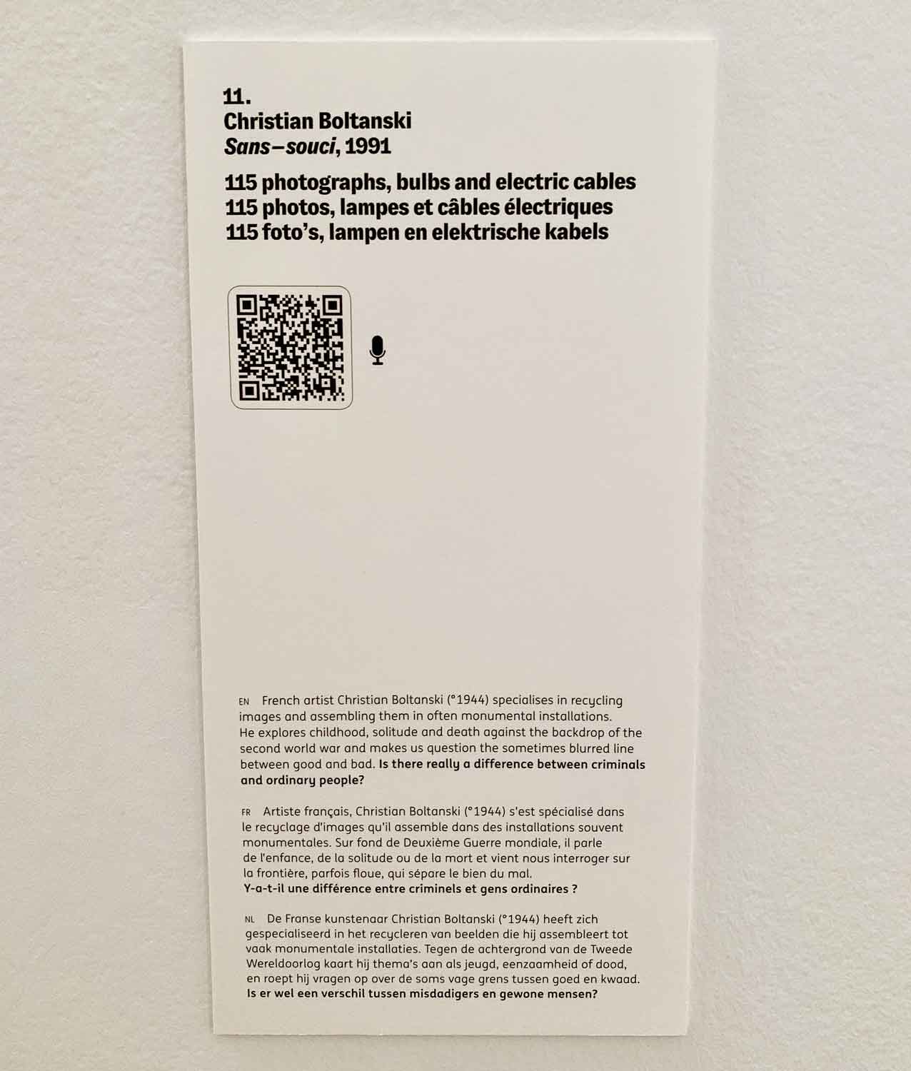 An exhibit label for the work of Christian Boltanski. The question at the bottom of the text is repeated in the audio guide.