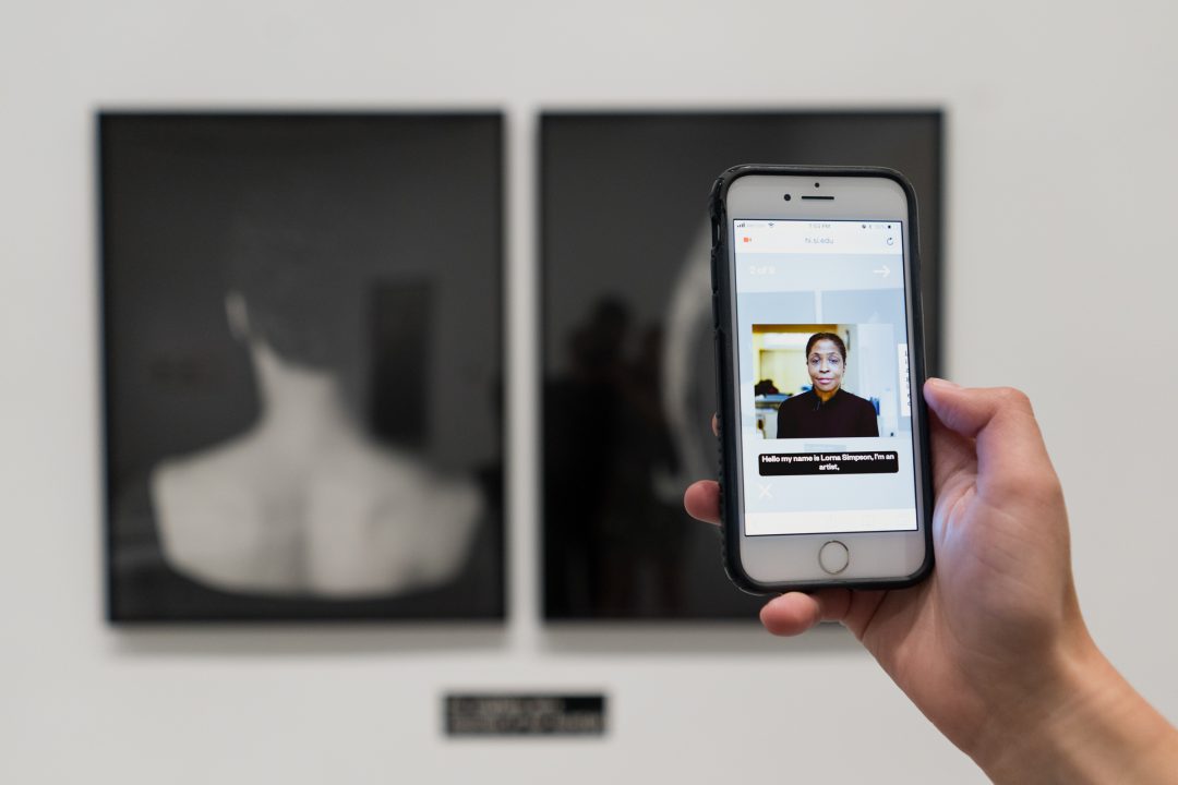 The Hirshhorn Eye app: visitors scan the artwork upon which a video of the artist appears.
