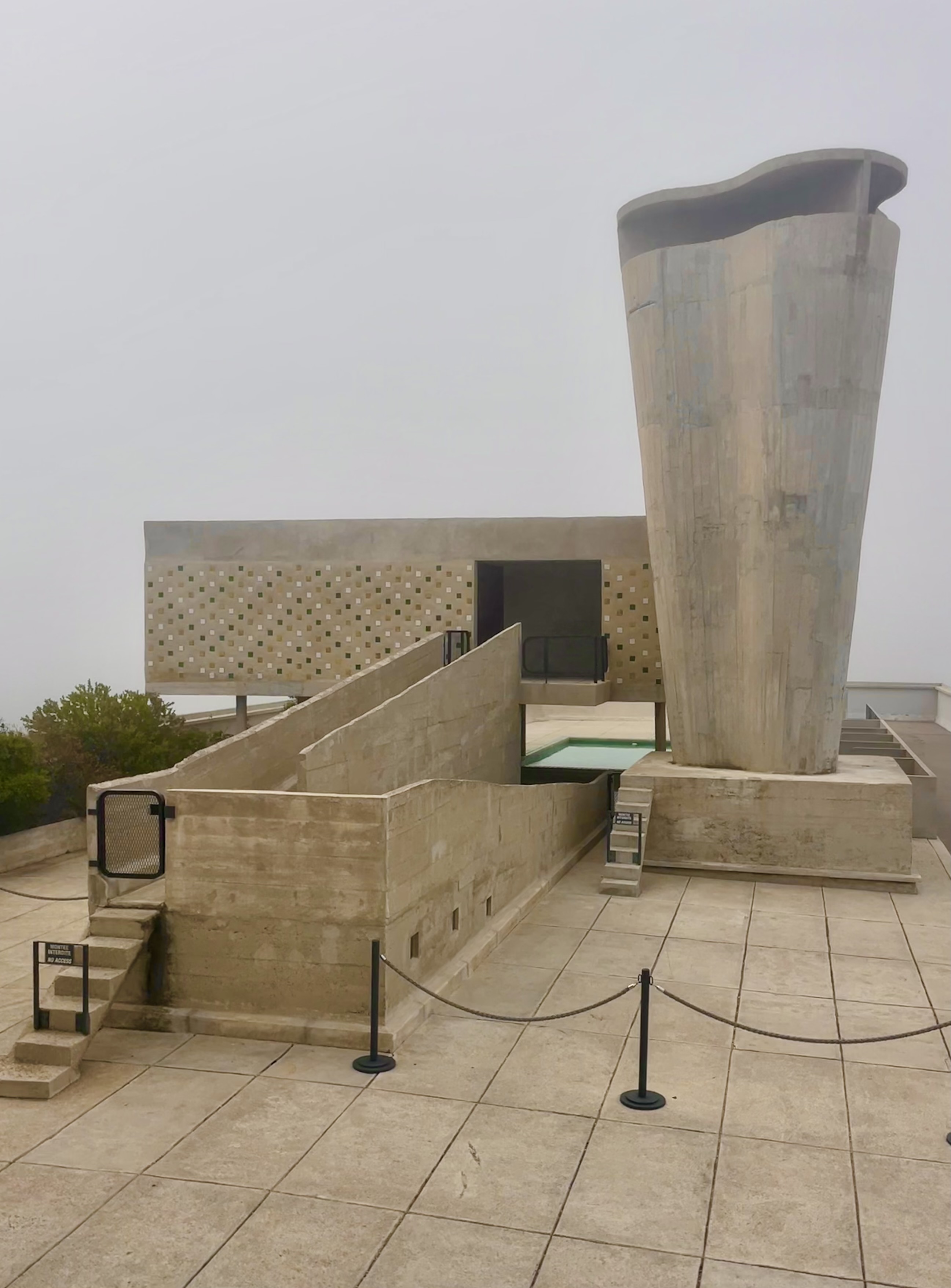 The rooftop of Le Corbusier’s Cité Radieuse, surrounded by the smoke coming from adjacent forest fires.